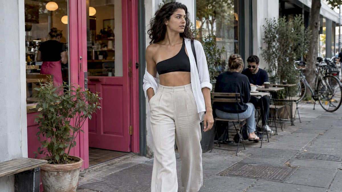 Woman styling asymmetrical bikini beyond beachwear