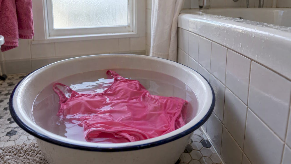Pink swimsuit soaking in warm water
